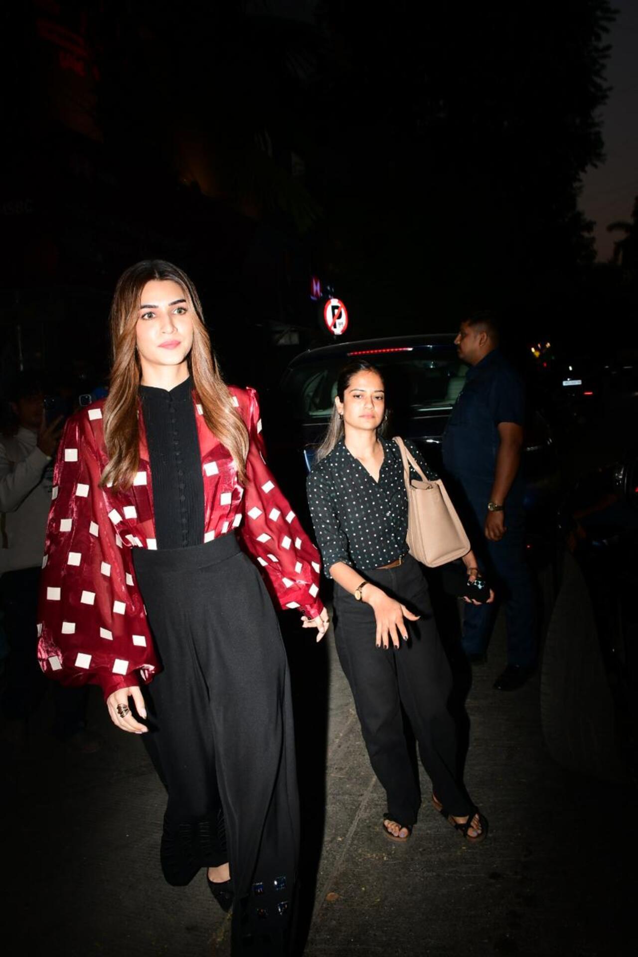 Kriti Sanon made a fashion statement as she stepped out in the city in a pant top, which had red and white printed panels.